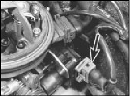 7C.10 Engine idle speed actuator/SPi unit lead connection (arrowed)