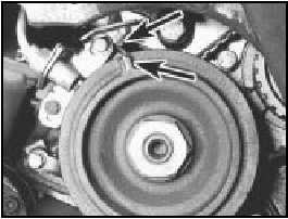 10.39 Crankshaft pulley timing marks (arrowed)