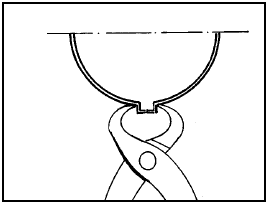 Fig. 13.97 Crimping the driveshaft boot securing band (Sec 13)
