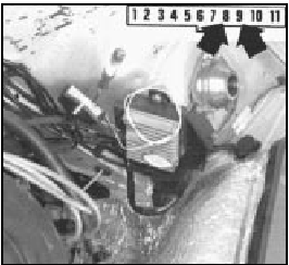 Fig. 4.13 Test lamp connected between terminals 8 and 9 of control unit