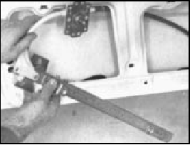 Fig. 12.10 Removing door window regulator (Sec 12)