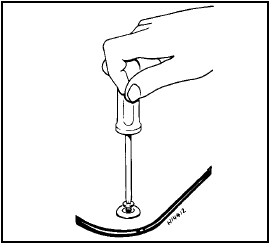 Fig. 12.25 Extracting sunroof panel screw (Sec 28)