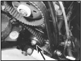 6B.20 Belt tensioner pulley locknut (arrowed)