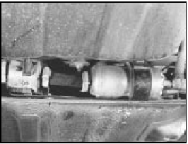 9C.5 Electric fuel pump/filter/pressure damper assembly location on a 1301 cc