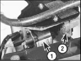 10.36 Ignition coil (1) and power module (2) on 1301 cc Turbo ie engine