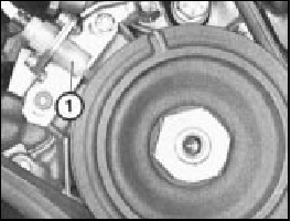 Fig. 13.77 Crankshaft pulley timing mark aligned with timing pointer -