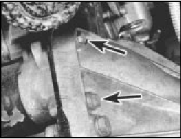 12B.24B . . . and retaining bolts (arrowed) on the 1372 cc ie engine