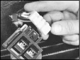 17.34B Disconnecting an electric window regulator switch plug